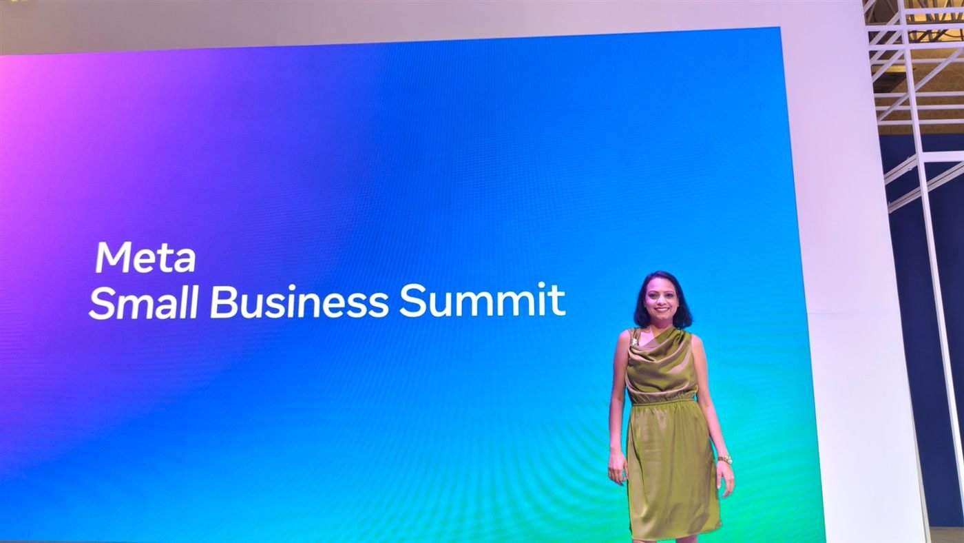 Vijayshree Kalani in front of the Meta Small Business Summit screen